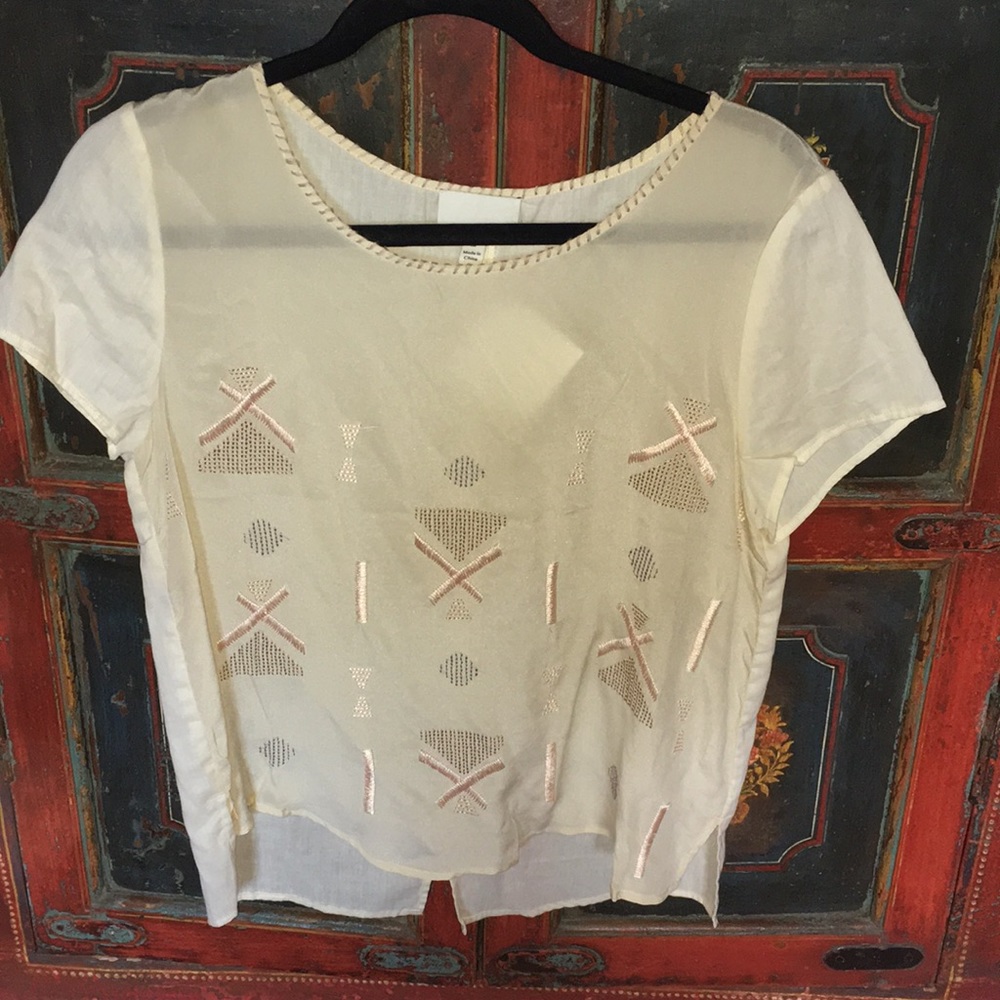 Cream blouse with detail